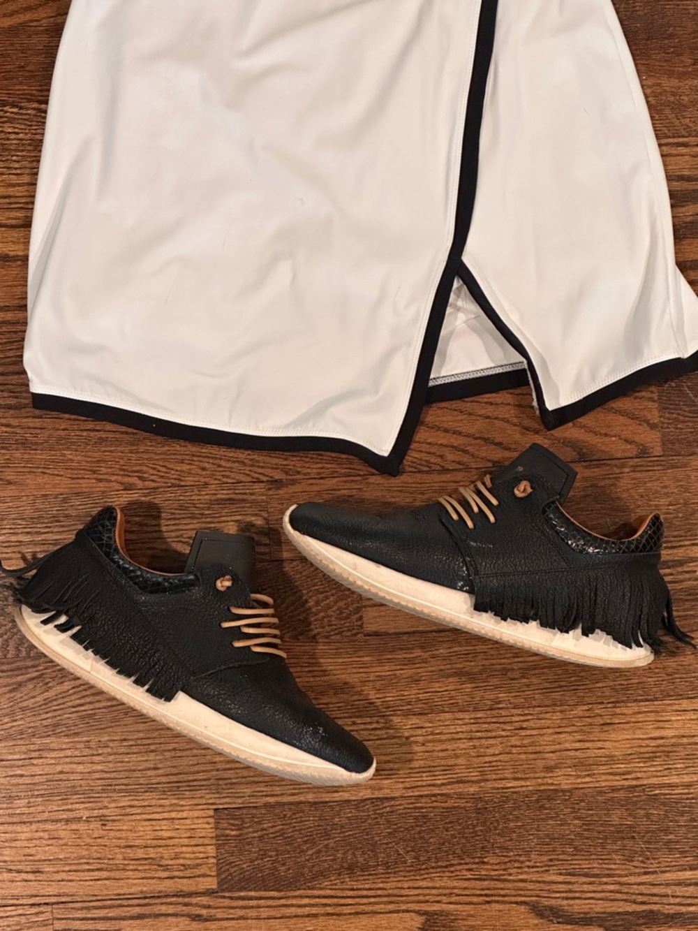 Esseutesse Women's Black Fringe Low-Top Sneaker with White Sole